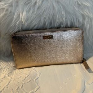 Kate Spade long wallet rose gold metallic leather